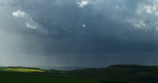 Link to Video | Saarland, rural area, Germany, time-lapse photography, 4K resolution, thunderstorm, agricultural land, hill, cloud, storm