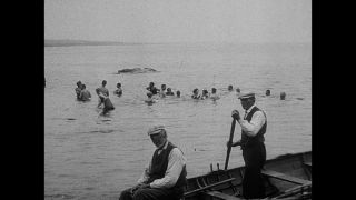 Link to Video | fun, summer, sea, leisure, swimsuit, one-piece swimsuit, liquid water, lifestyle, Sweden, 1910s, beach, swimming, black and white, joy