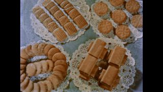 Link to Video | cookie, food, mass production, color, United States of America, wholesale bakery, assembly line, 1958, baking, factory