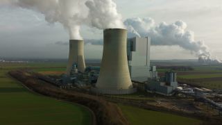 Link to Video | North Rhine-Westphalia, industrial building, smoke, energy supply, energy company, RWE Power, power station, environmental effects, Rhenish lignite mining area, environment, economic sector, Grevenbroich, building, aerial shot, particulates, sky, pollution, industrial sector, environmental protection