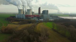 Link to Video | North Rhine-Westphalia, industrial building, smoke, energy supply, energy company, RWE Power, power station, environmental effects, Rhenish lignite mining area, environment, economic sector, Grevenbroich, building, aerial shot, particulates, sky, pollution, industrial sector, environmental protection
