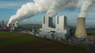 Link to Video | North Rhine-Westphalia, industrial building, smoke, energy supply, energy company, RWE Power, power station, environmental effects, Rhenish lignite mining area, environment, economic sector, Grevenbroich, building, aerial shot, particulates, sky, pollution, industrial sector, environmental protection