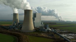 Link to Video | North Rhine-Westphalia, industrial building, smoke, energy supply, energy company, RWE Power, power station, environmental effects, Rhenish lignite mining area, environment, economic sector, Grevenbroich, building, aerial shot, particulates, sky, pollution, industrial sector, environmental protection