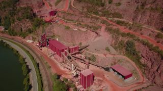 Link to Video | Geology, bird's-eye view, Rhineland-Palatinate, stone quarry, Taben-Rodt, Germany, manufacturing, quarry, mining and quarrying, mining company, mineral extraction, mining operations, aerial shot, nonmetallic minerals industry, industrial sector, mine, Trier-Saarburg