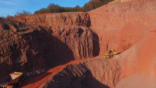 Link to Video | Geology, Rhineland-Palatinate, stone quarry, Taben-Rodt, excavator, Germany, manufacturing, quarry, mining and quarrying, mining company, mineral extraction, mining operations, dump truck, aerial shot, nonmetallic minerals industry, commercial vehicle, loading, industrial sector, mine, Trier-Saarburg