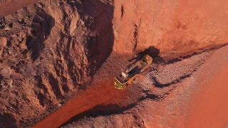 Link to Video | Geology, Rhineland-Palatinate, stone quarry, Taben-Rodt, excavator, Germany, manufacturing, quarry, mining and quarrying, mining company, mineral extraction, mining operations, dump truck, aerial shot, nonmetallic minerals industry, commercial vehicle, loading, industrial sector, mine, Trier-Saarburg