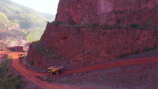 Link to Video | Geology, Rhineland-Palatinate, stone quarry, Taben-Rodt, Germany, manufacturing, quarry, mining and quarrying, mining company, mineral extraction, mining operations, dump truck, aerial shot, nonmetallic minerals industry, commercial vehicle, industrial sector, mine, Trier-Saarburg