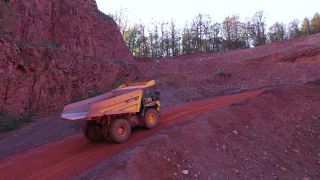 Link to Video | Geology, Rhineland-Palatinate, stone quarry, Taben-Rodt, Germany, manufacturing, quarry, mining and quarrying, mining company, mineral extraction, mining operations, dump truck, aerial shot, nonmetallic minerals industry, commercial vehicle, industrial sector, mine, Trier-Saarburg