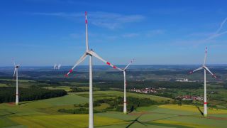 Link to Video | Büschdorf, landscape, machine, Saarland, renewable energy, turbine, electric generator, energy source, power station, electric power source, Germany, wind farm, wind turbine generator system, wind power, aerial shot, wind turbine, wind energy, sky
