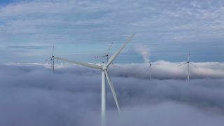 Link to Video | renewable energy, electric generator, energy source, electric power source, wind farm, wind turbine generator system, fog, alternative energy, wind power, aerial shot, wind turbine, wind energy, sky, Windturbine, cloud, industrial sector