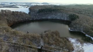 Link to Video | volcanic crater, Rhineland-Palatinate, winter, Eifel, Germany, maar, lake, crater, still waters, Europe, aerial shot, Vulkan Eifel, Mittelgebirge, snow