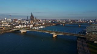 Link to Video | North Rhine-Westphalia, bridge, waterway, big city, Germany, Cologne, river, Europe, aerial shot, Rhine, urban district of North Rhine-Westphalia