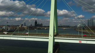 Link to Video | North Rhine-Westphalia, bridge, waterway, big city, Germany, Cologne, river, Europe, aerial shot, Rhine, urban district of North Rhine-Westphalia