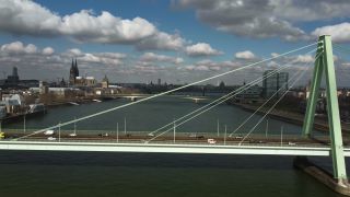 Link to Video | North Rhine-Westphalia, bridge, waterway, big city, Germany, Cologne, river, Europe, aerial shot, Rhine, urban district of North Rhine-Westphalia