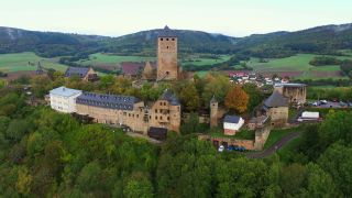 Link to Video | landscape, bird's-eye view, Rhineland-Palatinate, tourist destination, Thallichtenberg, physical location, Germany, castle, forest, Europe, aerial shot, Kusel, tourist attraction, human-made geographic feature, architectural structure, Kusel, Lichtenberg Castle, point of interest