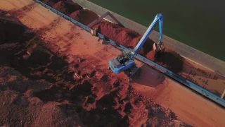 Link to Video | cargo ship, Saarland, cargo shipping, Saar, maritime transport, Merzig, logistics, excavator, Germany, loading, river, port, aerial shot, industrial sector