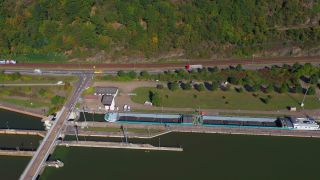 Link to Video | lock, cargo ship, landscape, bird's-eye view, Rhineland-Palatinate, canal, cargo shipping, Saar, maritime transport, Germany, Staustufe Serrig, water transport, Serrig, barrage, aerial shot, Serrig, human-made geographic feature, architectural structure