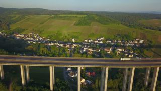 Link to Video | bird's-eye view, Rhineland-Palatinate, bridge, Verkehr, Germany, wine-producing region, vineyard, viticulture, aerial shot, transport, architectural structure, thoroughfare, Moselle Valley