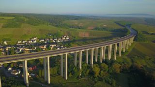 Link to Video | bird's-eye view, Rhineland-Palatinate, bridge, Verkehr, Germany, wine-producing region, vineyard, viticulture, aerial shot, transport, architectural structure, thoroughfare, Moselle Valley