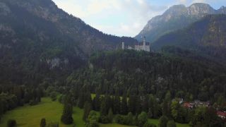 Link to Video | Swabia, landscape, bird's-eye view, tourist destination, Allgäu, Schwangau, Neuschwanstein Castle, mountain range, aerial shot, tourist attraction, nature, architectural structure, Bavaria