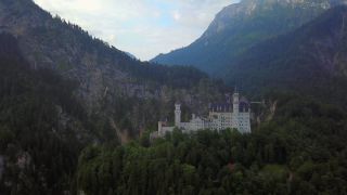 Link to Video | Swabia, landscape, bird's-eye view, tourist destination, Allgäu, Schwangau, Neuschwanstein Castle, mountain range, aerial shot, tourist attraction, nature, architectural structure, Bavaria