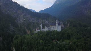 Link to Video | Swabia, landscape, bird's-eye view, tourist destination, Allgäu, Schwangau, Neuschwanstein Castle, mountain range, aerial shot, tourist attraction, nature, architectural structure, Bavaria