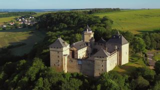 Link to Video | Lorraine, bird's-eye view, tourist destination, France, Manderen, castle, Château de Malbrouck, aerial shot, tourist attraction, architectural structure, point of interest
