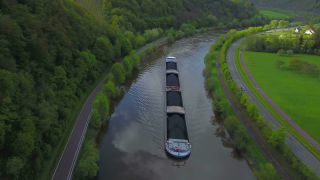 Link to Video | cargo ship, bird's-eye view, Rhineland-Palatinate, waterway, transport, cargo shipping, Saar, Germany, river, aerial shot, inland navigation, Kastel-Staadt, transport, thoroughfare, land waters, riverboat
