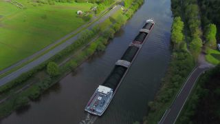 Link to Video | cargo ship, bird's-eye view, Rhineland-Palatinate, waterway, transport, cargo shipping, Saar, Germany, river, aerial shot, inland navigation, Kastel-Staadt, transport, thoroughfare, land waters, riverboat