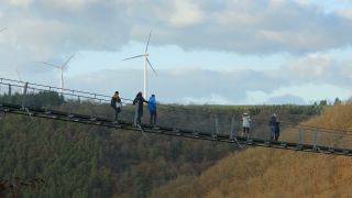 Link to Video | footbridge, landscape, Rhineland-Palatinate, tourist destination, bridge, suspension bridge, autumn, Hunsrück-Hochwald National Park, Germany, Geierlay, color, 4K resolution, landform, Hunsrück, footpath, simple suspension bridge, valley, forest, daytime, Kastellaun, tourist attraction, Sosberg, Mörsdorf, nature, architectural structure, thoroughfare, Rhein-Hunsrück-Kreis, point of interest