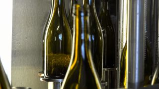 Link to Video | machine, liquid, bottling company, alcoholic beverage, winery, bin, wine-producing region, viticulture, wine, bottling, mechanism, bottling line, Mosel-Saar-Ruwer, bottle, container
