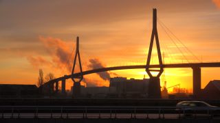 Link to Video | Hamburg, dawn, bridge, city-state, big city, million city, Verkehr, logistics, Germany, port settlement, Köhlbrand Bridge, Silhouette, red sky at morning, Köhlbrand, transport, morning, human-made geographic feature, architectural structure