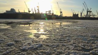 Link to Video | Hamburg, waterway, winter, city-state, big city, maritime transport, million city, Elbe, Germany, port settlement, ice, ice floe, river, port