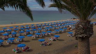 Link to Video | vacation, tourist destination, paid leave, sea, leisure, deckchair, seawater, recreation, Puerto del Carmen, Spain, beach, Visa Waiver Program, tourism, tourist, Canary Islands, travel, paid time off, Atlantic Ocean