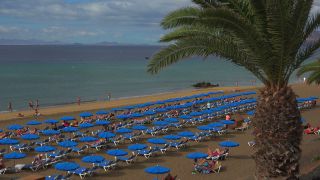 Link to Video | vacation, tourist destination, paid leave, sea, leisure, deckchair, seawater, recreation, Puerto del Carmen, Spain, beach, Visa Waiver Program, tourism, tourist, Canary Islands, travel, paid time off, Atlantic Ocean