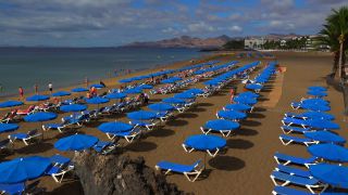 Link to Video | vacation, tourist destination, paid leave, sea, leisure, deckchair, seawater, recreation, Puerto del Carmen, Spain, beach, Visa Waiver Program, tourism, tourist, Canary Islands, travel, paid time off, Atlantic Ocean