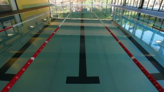 Link to Video | sports venue, swimming place, architecture, swimming pool, swimming center, swimming, indoor swimming pool, leisure facility, water sport, human-made geographic feature, architectural structure