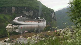 Link to Video | Geiranger, vacation, tourist destination, sea, cruise, leisure, Geirangerfjord, Norway, Scandinavia, Northern Europe, cruise ship, Europe, Nordic countries, tourist attraction, paid time off, UNESCO World Heritage Site, point of interest