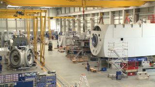 Link to Video | technology, renewable energy, electric generator, hall, industry, wind turbine generator system, alternative energy, wind power, wind turbine, wind energy, production, industrial sector, factory