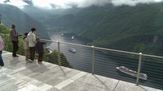 Link to Video | Geiranger, landscape, tourist destination, West Norwegian Fjords – Geirangerfjord and Nærøyfjord, body of water, cruise, Geirangerfjord, Norway, Scandinavia, natural heritage, cruise ship, fjord, Nordic countries, tourist attraction, transport, UNESCO World Heritage Site