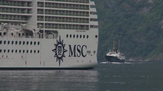 Link to Video | Geiranger, landscape, vacation, tourist destination, West Norwegian Fjords – Geirangerfjord and Nærøyfjord, body of water, cruise, leisure, Geirangerfjord, Norway, Scandinavia, natural heritage, cruise ship, fjord, Nordic countries, tourist attraction, paid time off, transport, UNESCO World Heritage Site