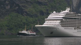 Link to Video | Geiranger, landscape, tourist destination, West Norwegian Fjords – Geirangerfjord and Nærøyfjord, body of water, cruise, Geirangerfjord, Norway, Scandinavia, natural heritage, cruise ship, fjord, Nordic countries, tourist attraction, transport, UNESCO World Heritage Site