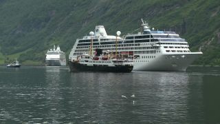 Link to Video | Geiranger, landscape, tourist destination, West Norwegian Fjords – Geirangerfjord and Nærøyfjord, body of water, cruise, Geirangerfjord, Norway, Scandinavia, natural heritage, cruise ship, fjord, Nordic countries, tourist attraction, transport, UNESCO World Heritage Site