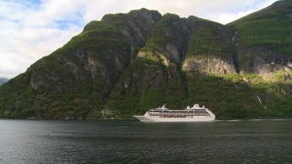 Link to Video | Geiranger, landscape, tourist destination, West Norwegian Fjords – Geirangerfjord and Nærøyfjord, body of water, cruise, Geirangerfjord, Norway, Scandinavia, natural heritage, cruise ship, fjord, Nordic countries, tourist attraction, transport, UNESCO World Heritage Site