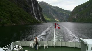 Link to Video | Geiranger, landscape, tourist destination, West Norwegian Fjords – Geirangerfjord and Nærøyfjord, body of water, cruise, Geirangerfjord, Norway, Scandinavia, natural heritage, cruise ship, fjord, Nordic countries, tourist attraction, transport, UNESCO World Heritage Site