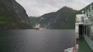 Link to Video | Geiranger, landscape, vacation, tourist destination, West Norwegian Fjords – Geirangerfjord and Nærøyfjord, body of water, cruise, leisure, Geirangerfjord, Norway, Scandinavia, natural heritage, cruise ship, fjord, Nordic countries, tourist attraction, paid time off, transport, UNESCO World Heritage Site