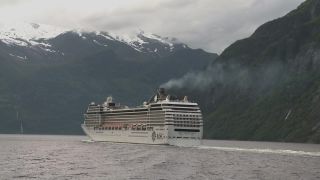 Link to Video | Geiranger, landscape, vacation, tourist destination, West Norwegian Fjords – Geirangerfjord and Nærøyfjord, body of water, cruise, leisure, Geirangerfjord, Norway, Scandinavia, natural heritage, cruise ship, fjord, Nordic countries, tourist attraction, paid time off, transport, UNESCO World Heritage Site