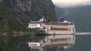 Link to Video | Geiranger, vacation, West Norwegian Fjords – Geirangerfjord and Nærøyfjord, body of water, paid leave, cruise, leisure, Geirangerfjord, Norway, Scandinavia, Northern Europe, cruise ship, fjord, Norwegian Sea, tourism, Møre og Romsdal, tourist attraction, travel, paid time off, transport, UNESCO World Heritage Site
