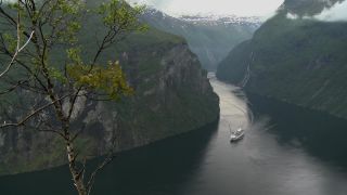 Link to Video | Geiranger, vacation, West Norwegian Fjords – Geirangerfjord and Nærøyfjord, body of water, paid leave, cruise, leisure, Geirangerfjord, Norway, Scandinavia, Northern Europe, cruise ship, fjord, Norwegian Sea, tourism, Møre og Romsdal, tourist attraction, travel, paid time off, transport, UNESCO World Heritage Site