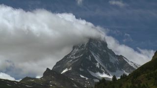 Link to Video | weather, tourist destination, Alps, Matterhorn, summit, region of interest, Swiss Alps, meteorology, landform, Switzerland, Europe, mountain range, tourist attraction, Italy–Switzerland border, cloud, Valais, mountain, point of interest